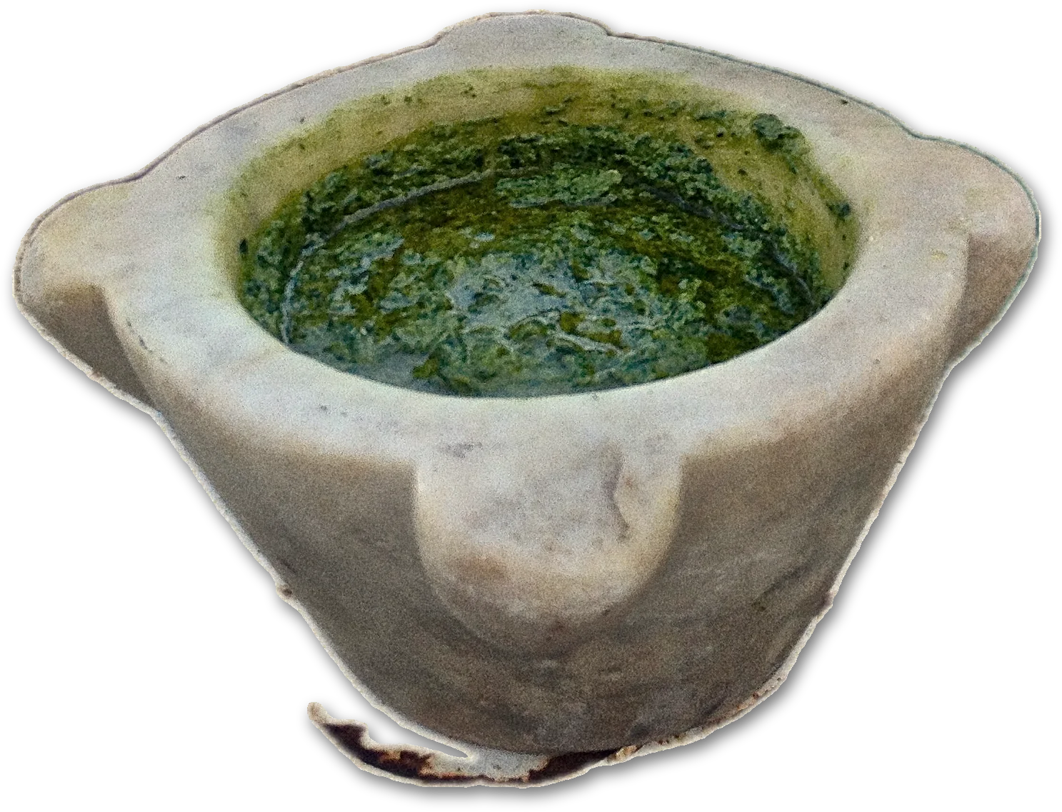 Basil pesto in a white marble mortar, cut out