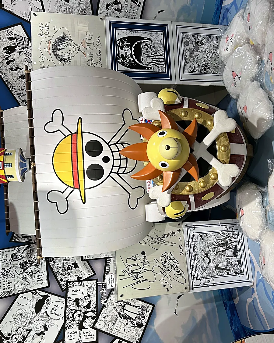 Thousand Sunny figurehead and One Piece manga wall, Shibuya